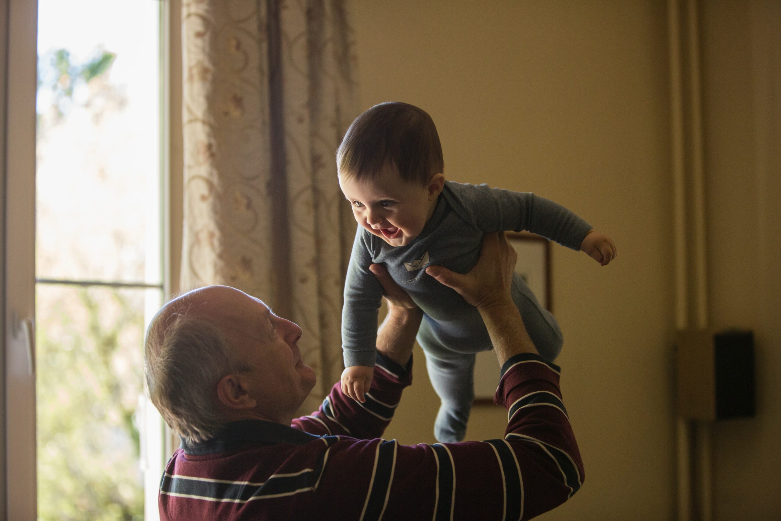 Grandfather bonding with Grandchild